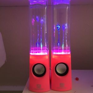 A set of pink water speakers